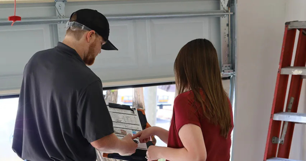 Technician explains checklist to woman.