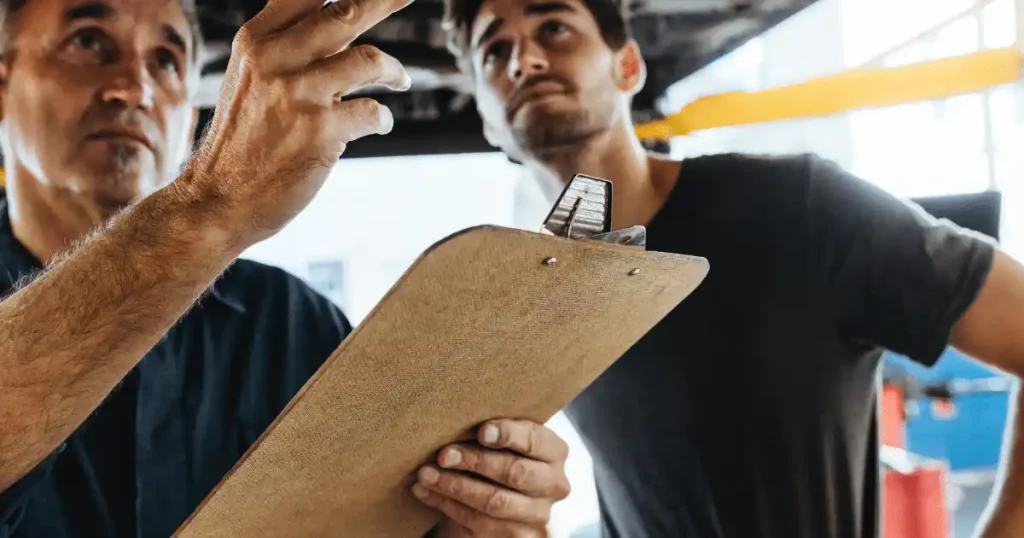 people talking holding a clipboard